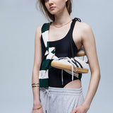 Magnolia Bodysuit Yin. Sustainable sports bodysuit for women