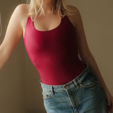 Magnolia Bodysuit Wine. Sustainable women's sports bodysuit