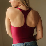 Magnolia Bodysuit Wine. Sustainable women's sports bodysuit